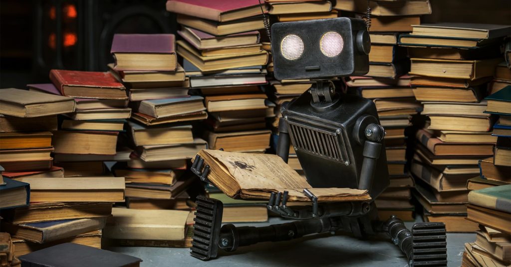 Roboter liest ein Buch: Symbolbild für das Training eines Chatbots für Marketingkampagne